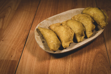 Delicious traditional Colombian empanadas with spicy sauce