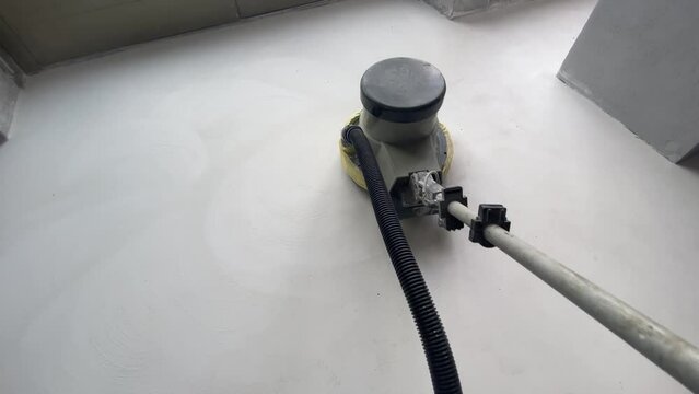 Floor grinding for decorative microcement finishing