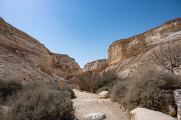 Trail head of the Canyon of Ein Avdat National Park, oasis in the Negev Desert, Southern Israel, Text is: Ein Avdat, Ein Mor