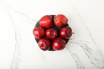 Fresh red apples. On a white  stone background. Top view.