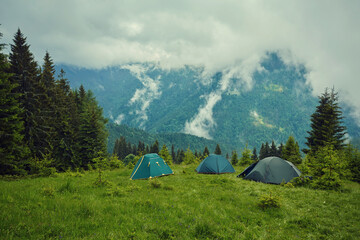 Camping on the holiday. Camping on the grass. Camping on the mountain fog beautiful sea view.