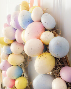 colorful easter eggs attached to a wreath