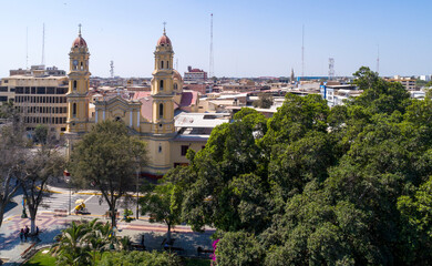 Fototapeta na wymiar Piura, Peru: aerial drone view of the main square and the cathedral church of the city