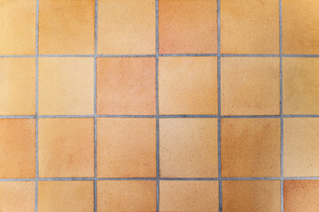 Tile brown yellow old floor with cement, background texture