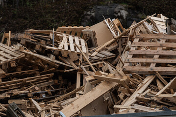 Destroyed wooden pallets at a landfill.