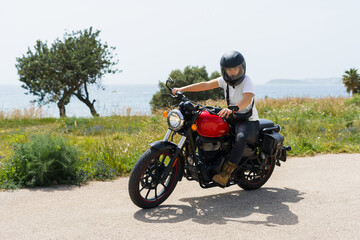 Fototapeta premium Woman riding a big motorcycle