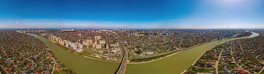 Fototapeta na wymiar very large aerial panorama of the city of Krasnodar near the Kuban river near the Turgenev bridge