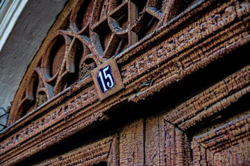Vintage plate on the house with the number 15