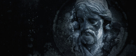 Fototapeta na wymiar Jesus Christ. Fragment of an ancient statue. Copy space.