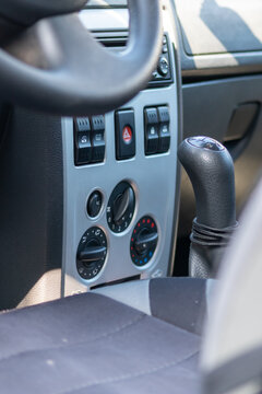 Gear shifter or shift nob to manually switch between car gears in classic cars. Hand control of gear shifts for racing feeling and fast acceleration.