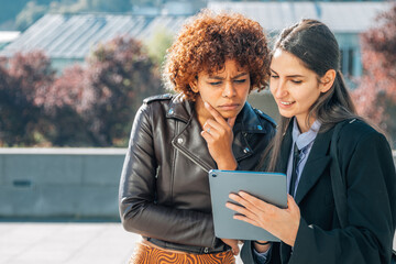 girls in the street with tablet