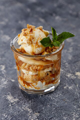 ice cream with fresh fruits and syrup