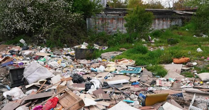 5 a wild dump in the center of the city in Europe made of various types of garbage in various forms