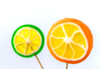 orange and lime, candy with handle 
