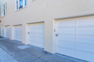 Fototapeta na wymiar Sectional white garage door of townhouses at San Francisco, California