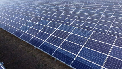 Solar power stations. Blue solar power plant modules close up. Alternative renewable clean green...