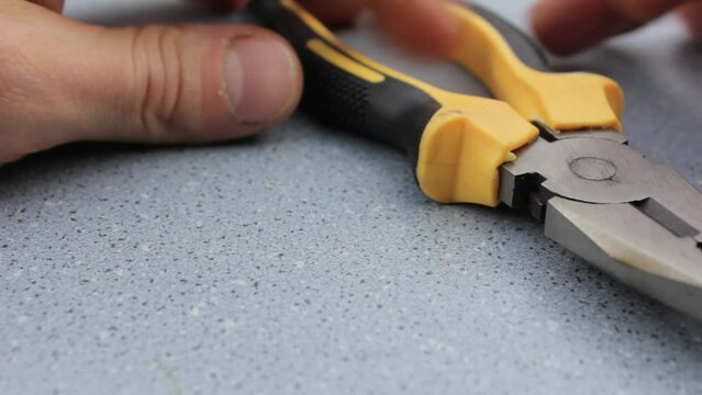 Pliers tool. Construction pliers close-up.