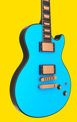 Close-up Electric acoustic guitar isolated on yellow background.