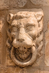 Lion head - Medieval sculpture at Montblanc, Tarragona, Spain - Detail
