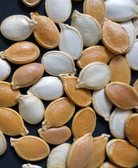 ten slices of pumpkin seeds, pumpkin seeds organic ancestor seeds, close-up pumpkin seeds,