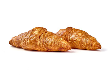 Freshly baked croissants, isolated on white background.