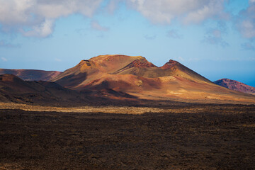 Fototapeta na wymiar Panoramic view of the volcanoes of the island of Lanzarote (Spain) from the Timanfaya national park