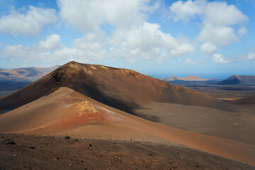 Fototapeta na wymiar Panoramic view of the volcanoes of the island of Lanzarote (Spain) from the Timanfaya national park