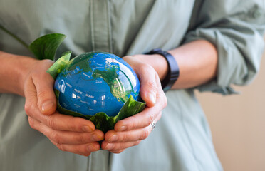 hand holding globe environment esg concept