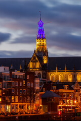 Haarlem Grote Kerk church at night, with Ukraine colors