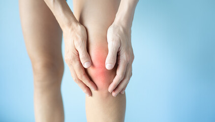 closeup of woman knee suffering from Joint pain, injury, arthritis problem 