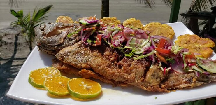 Steaming hot fried fish is the best in front of the beach with a fresh salad. Yummy food