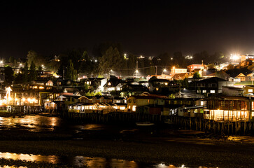 Fototapeta na wymiar Night view of the stilt houses of Castro, Chiloe