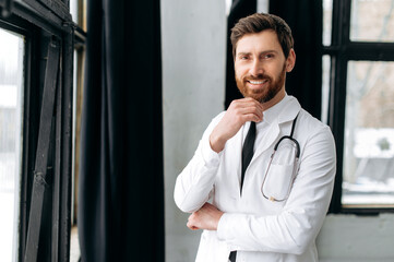 Portrait of proud confident caucasian professional therapist, surgeon, cardiologist in a medical...
