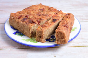 Fluffy bread cake with guava flavor on wooden background