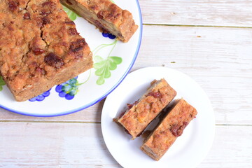 Fluffy bread cake with guava flavor on wooden background