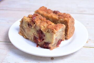Fluffy bread cake with guava flavor on wooden background