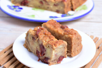 Fluffy bread cake with guava flavor on wooden background