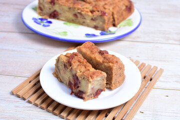Fluffy bread cake with guava flavor on wooden background