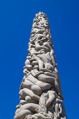 Fototapeta na wymiar stone people sculptures in park