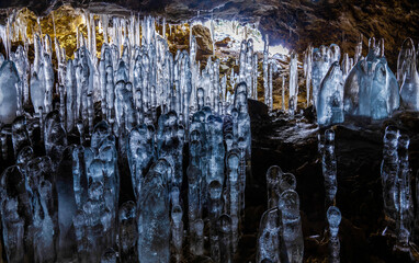 Fototapeta na wymiar Ice stakes in the cave