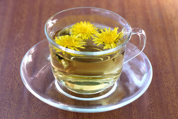 Cup of herbal tea of a dandelion