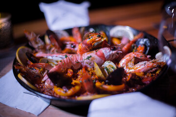 Fresh Paella dish on the table