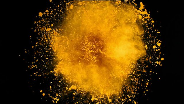 Super Slow Motion Shot of Rotating Yellow Powder Expolosion Isolated on Black Background at 1000fps.