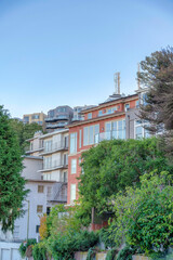 Layered apartment buildings on a slope at San Francisco, California
