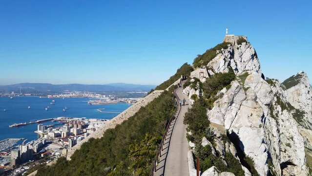 Gibraltar overview.  In sunshine. Pan left to the town area
