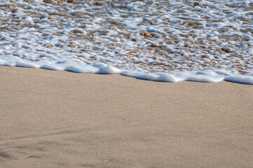waves on the sand