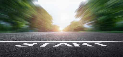 Start up background. Word start written on asphalt road. Start line on the highway  for business...