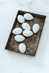Obraz na płótnie Canvas White Hard Boiled Egg in Kitchen on White Background