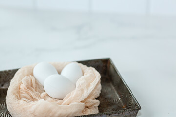 Fototapeta na wymiar White Hard Boiled Egg in Kitchen on White Background
