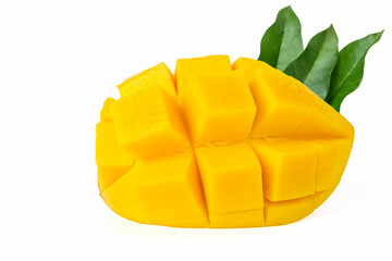 Ripe yellow Nam Dok Mai mango halved with green leaves. isolated on white background.